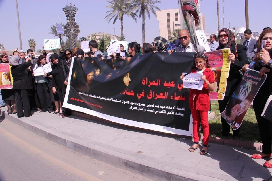 Demonstrators in Baghdad call International Women's Day a "day of mourning" in protest of Iraq's new draft Jaafari Personal Status Law. 