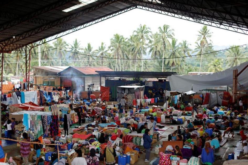 Displaced families stay at an evacuation centre outside the city, as army troops continue their assault against insurgents from the Maute group in Marawi city, Philippines, July 3, 2017.