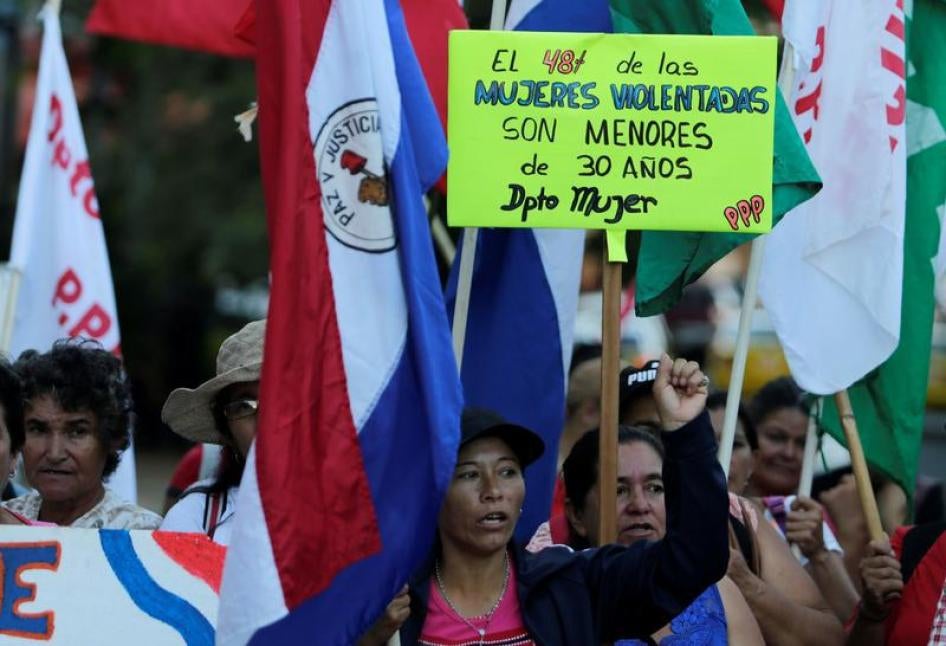 Paraguayan social activists protest in front of the Health Ministry to demand the end of violence against women and better health care for women, as the world celebrates "International Women's Day" in Asuncion, Paraguay, March 8, 2017. 