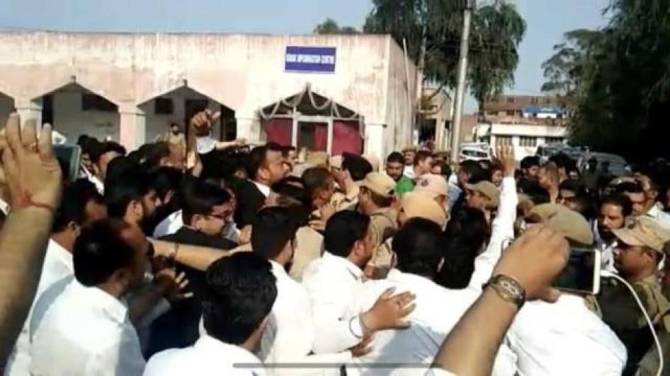 Lawyers clash with police outside a courthouse in India's Jammu and Kashmir state, April 9, 2018.