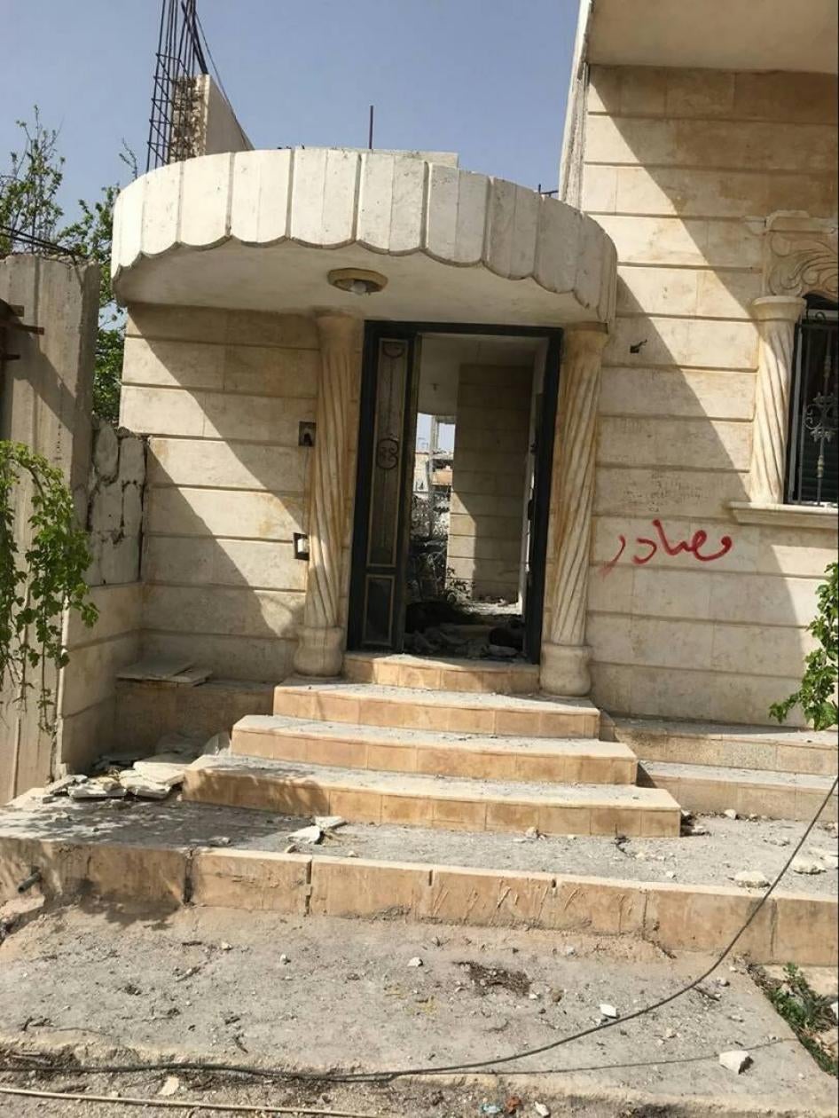 Roni Haji’s house with ‘confiscated’ written on it.