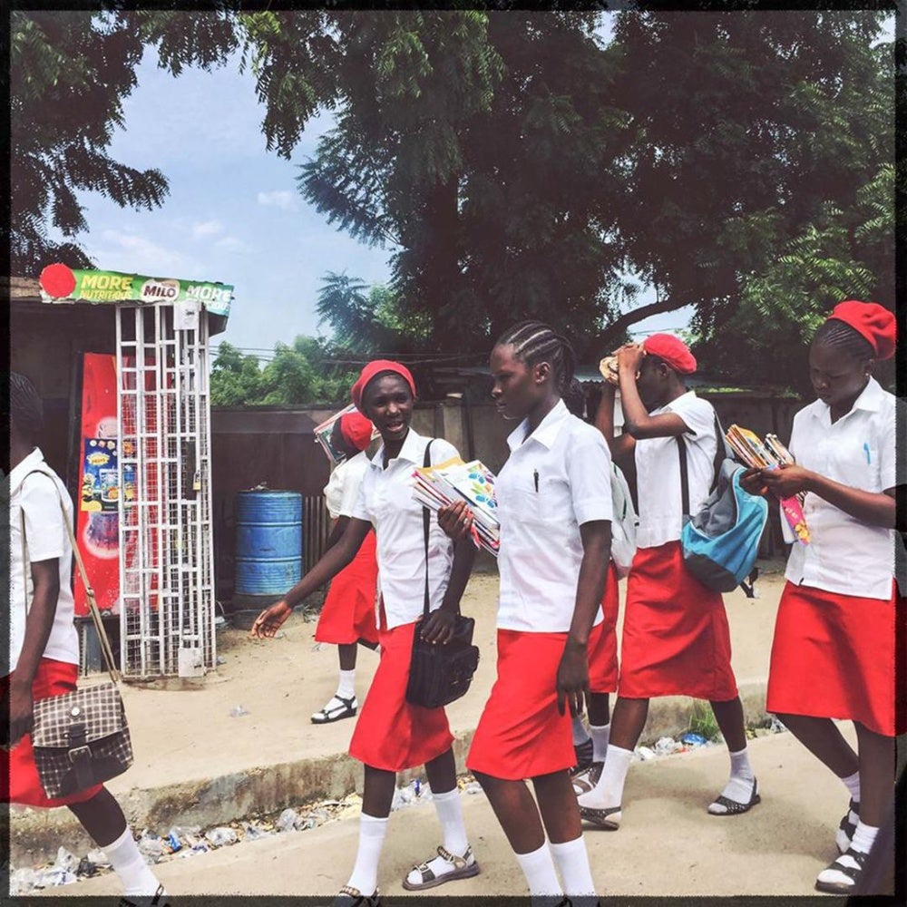 School girls walk home after class in Maiduguri, Borno state, September 2015. They are among a small group of students still able to study in the northeast. Many other schools have been closed.  