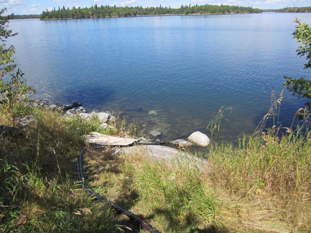 Pipe in Shoal Lake 40 First Nation which has been under a boil water advisory since 1997. The pipe delivers raw lake water to a pump house for disinfection, before it is pumped out to households for domestic use.