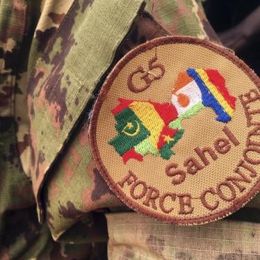 A soldier stands guard in front of the G5-Sahel Counter Terrorism Force headquarters in Mali, May, 30, 2018. 