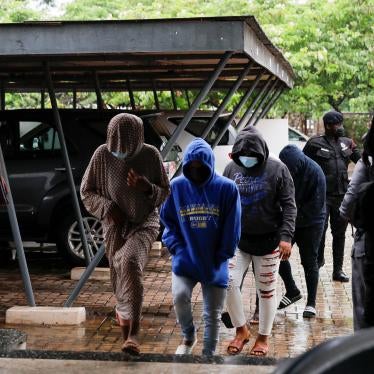 People who were detained by police on suspicion of promoting an LGBT agenda at an unlawful assembly arrive at a court for a bail hearing in Ho, Volta Region, Ghana on June 4, 2021.