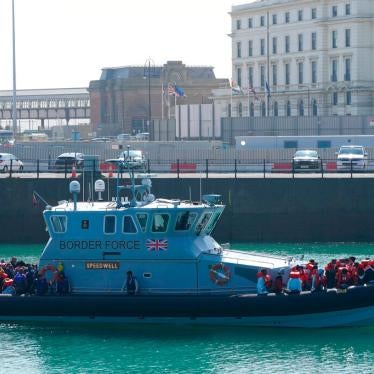 A group of people thought to be migrants are brought into Dover, Kent, by Border Force officers on September 5, 2021.