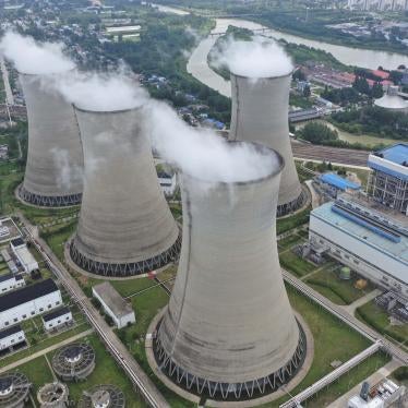Steam billows out of the cooling towers of a coal-fired power plant in Huai'an in east China's Jiangsu province, July 20, 2021.