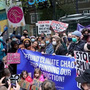 Climate activist Greta Thunberg, center, demonstrates with others in front of the Standard and Chartered Bank during a climate protest in London, England, October 29, 2021