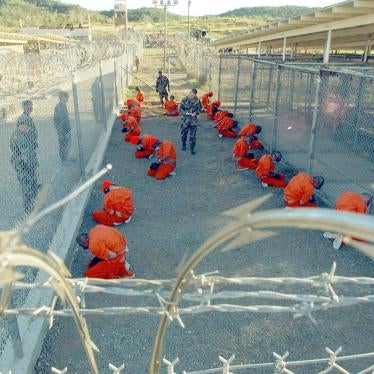 The first foreign Muslim men imprisoned by the US military at the detention center at Guantánamo Bay, Cuba, in the so-called “global war on terror.” Since January 2002, the US has held nearly 800 men and boys at Guantánamo. Of the 39 who currently remain, 27 have never been charged. © 2002 Shane McCoy/Greg Mathieson/Mai/Getty Images