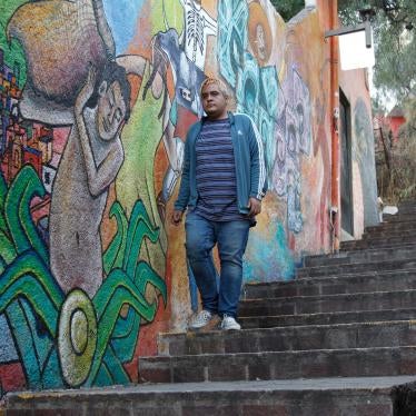 Fausto Martínez descends a flight of stairs in Guanajuato, Mexico, February 18, 2022.