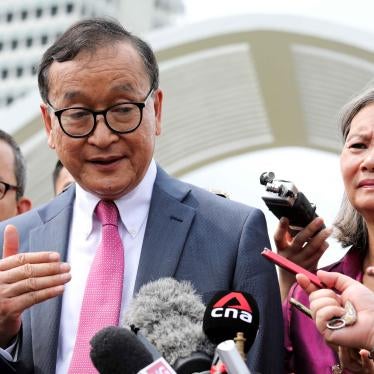 Self-exiled Cambodian opposition party founder Sam Rainsy (L) and Mu Sochua (R), deputy president of the Cambodia National Rescue Party (CNRP), speak to the media in Kuala Lumpur, Malaysia, November 12, 2019.