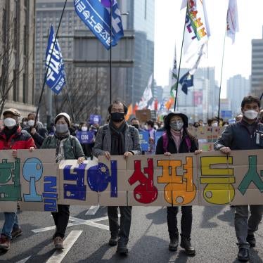Civil society organizations and activists march in a rally for International Women's Day