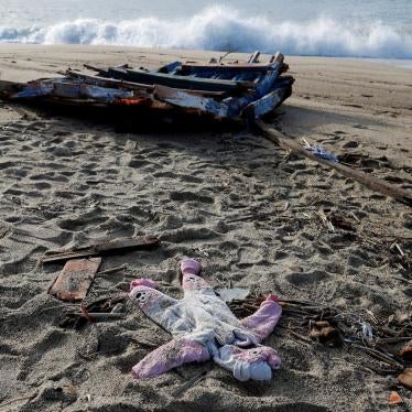 A piece of the boat and a piece of baby clothing from the deadly migrant shipwreck in Steccato di Cutro near Crotone, Italy