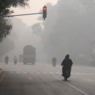 Vehicles and motorcyclists amid severe air pollution in Lahore, Pakistan, November 24, 2023.