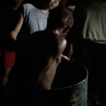 A video still shows Indonesian soldiers seriously mistreating a Papuan man in their custody in Gome, Central Papua, March 2024.