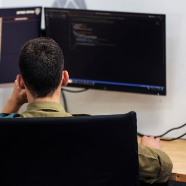 A technologist with the Israeli military's Matzpen operational data and applications unit works at his station, at an Israel Defense Force base in Ramat Gan, Israel, June 11, 2023. 