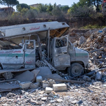 An ambulance lies destroyed in the rubble of an Israeli airstrike in Kafra, Lebanon on October 9, 2024.