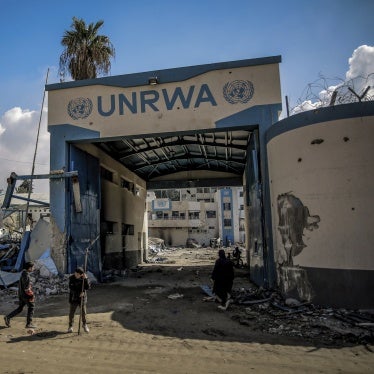 alestinians examine damage to the United Nations Relief and Works Agency for Palestine Refugees (UNRWA) buildings after the Israeli army withdrew from north of Gaza City, February 10, 2024.