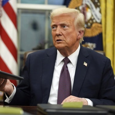 US President Donald Trump signs executive orders in the Oval Office of the White House, Washington, DC,  January 20, 2025.