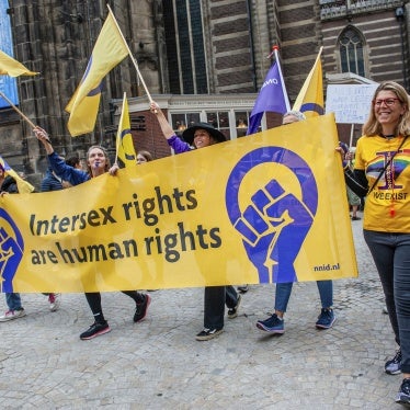 Marchers carry a banner in support of intersex rights in Amsterdam, Netherlands.