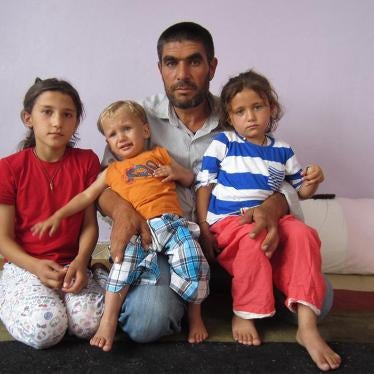 Mohammed, 42 and three of his relatives who were orphaned in the attack on June 25, 2015 in Kobani, Syria. 