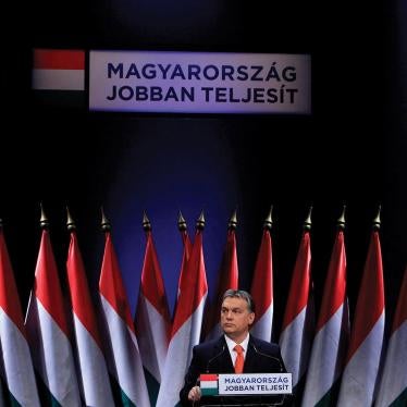 Hungarian Prime Minister Viktor Orban presents his annual state-of-the-nation speech in Budapest, February 22, 2013. The background reads : Hungary doing better.