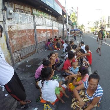 These street dwellers in Dakota, a community in Manila not far from the Philippine International Convention Center where the APEC summit will be held, have been told by local authorities to “keep off the streets” for at least a week beginning November 16,