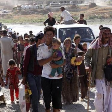 Yezidis at the Iraqi-Syrian border crossing in Fishkhabour, Dohuk province, August 10, 2014.
