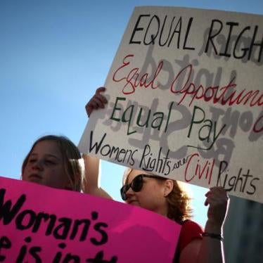 A mother and her daughter participate in the International Women's Day "A Day Without a Woman" protest in Los Angeles, California, U.S., March 8, 2017.