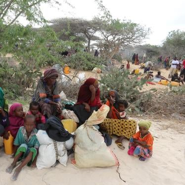 Somali families rest as they flee from drought-stricken Lower Shabelle region before entering makeshift camps in Somalia's capital, Mogadishu, joining the thousands already displaced, March 17, 2017. Al-Shabab forces attacked villages in Lower Shabelle re