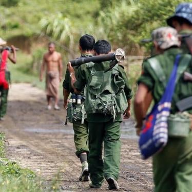 Burmese soldiers patrol a road in Maungdaw, Rakhine State, August 31, 2017.
