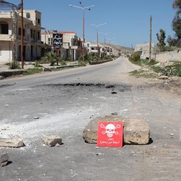 A poison hazard danger sign is seen in the town of Khan Sheikhoun, Idlib province, Syria on April 5, 2017. 