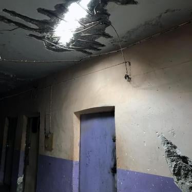 A hole in the ceiling of the second prison house, from a projectile that hit the building while the area was still under ISIS-control. Staff said the prison, holding 270 detainees, was structurally unsound and could collapse at any point.