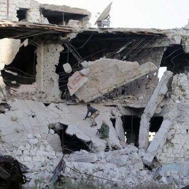 Members of the Libyan National Army climb a destroyed building during clashes with opposing forces from the Benghazi Revolutionaries Shura Council, in Sidi Khreibish neighborhood in Benghazi, Libya, November 10, 2017. 