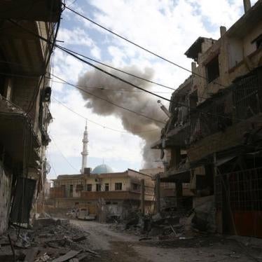 Smoke rises from the rebel held besieged town of Hamouriyeh, eastern Ghouta, near Damascus, Syria, February 21, 2018. © 2018 Reuters