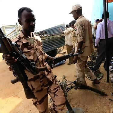 Rapid Support Forces upload disarmed weapons for display during Sudanese President Omar al-Bashir visit to the war-torn Darfur region at Rapid Support Forces Headquarter in Umm Al-Qura, Darfur, Sudan September 23, 2017.