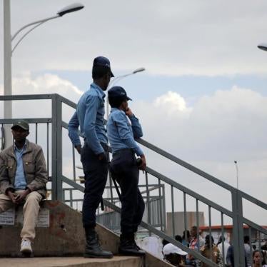 Ethiopia's police officers watch over a foot bridge as they patrol the streets of Addis Ababa, Ethiopia February 21, 2018.