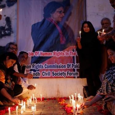 People light candles for the human rights campaigner Asma Jahangir, who died on Sunday in Lahore, during candlelight vigil in Karachi, Pakistan February 12, 2018. 