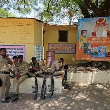 Policemen rest as they guard inside Asaram Bapu's ashram, before a court convicted him for raping a teenage girl, in Ahmedabad, India, April 25, 2018. REUTERS/Amit Dave