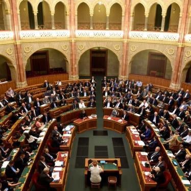 Members of the Hungarian government vote on the 'Stop Soros' package of bills that criminalises some help given to illegal immigrants, at the Parliament in Budapest, Hungary, June 20, 2018. 