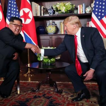 U.S. President Donald Trump shakes hands with North Korea's leader Kim Jong Un before their bilateral meeting at the Capella Hotel on Sentosa island in Singapore June 12, 2018.