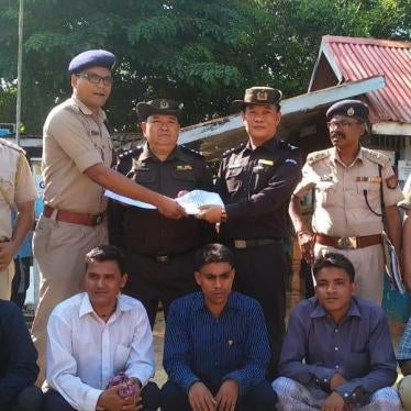 Indian police transfer seven ethnic Rohingya to Myanmar officials in Moreh, Manipur, India, October 4, 2018.