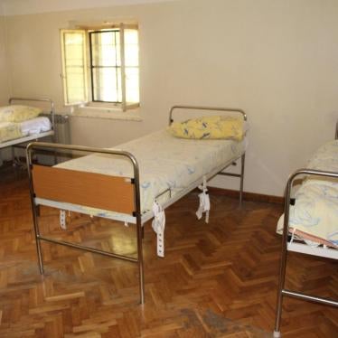 Restraints on a bed in a seclusion room for children in a psychiatric hospital