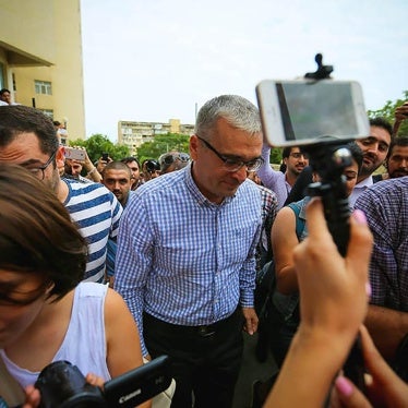 Azerbaijani opposition leader Ilgar Mammadov, amid a crowd of supporters just after being released from prison.