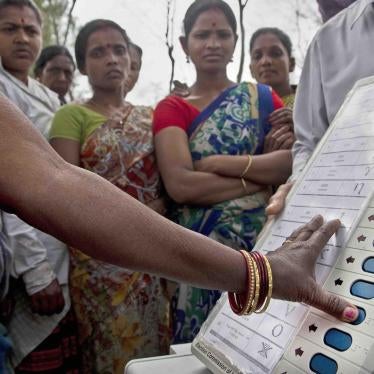 A woman casts her vote on a demo electronic voting machine during an election awareness drive ahead of India’s general election in Jorhat, India, April 1, 2019.