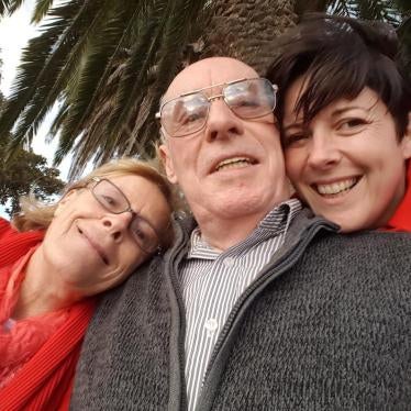 Photograph of three people featured in the video.