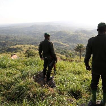 Congolese soldiers stand in a field camp in Paida, near Beni, North Kivu province, Democratic Republic of Congo, on December 7, 2018.