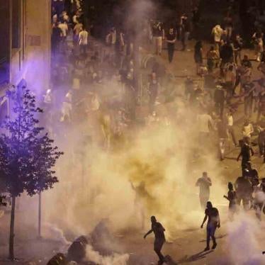 Lebanese riot police fire tear gas during a protest against government's plans to impose new taxes in Beirut, Lebanon, October 18, 2019. 