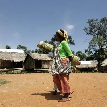 A Batek woman walks near her village in Kuala Koh, Kelantan, Malaysia.